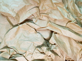 Crumpled sheet of brown kraft paper