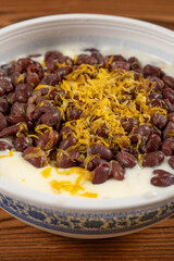 angle view chrysanthemum and red bean double-skin milk at vertical composition