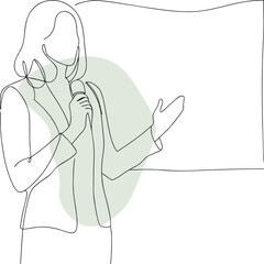 Woman speaking into microphone gesturing towards screen