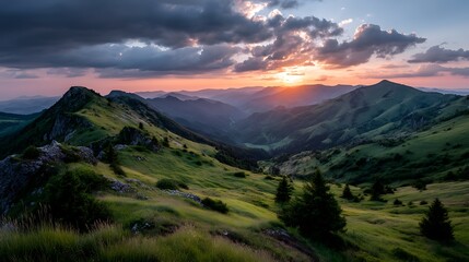 A stunning nature summer scene with green grass covering mountain hills, while a beautiful sunset casts a warm glow over the landscape, seen through a wide-angle lens.