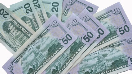 American or US dollars in form of a bunch of fifty and twenty dollar bills - money in the USA