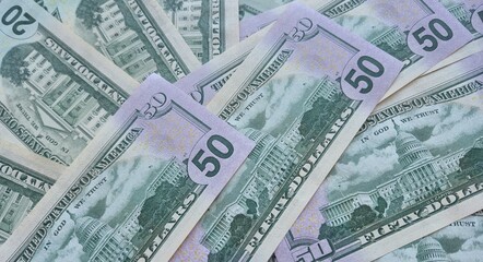 American or US dollars in form of a bunch of fifty and twenty dollar bills - money in the USA