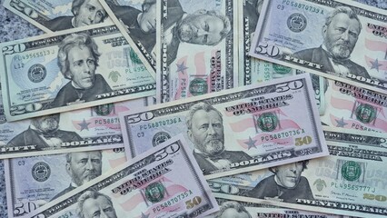 American or US dollars in form of a bunch of fifty and twenty dollar bills - money in the USA