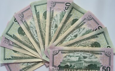 American or US dollars in form of a bunch of fifty and twenty dollar bills - money in the USA
