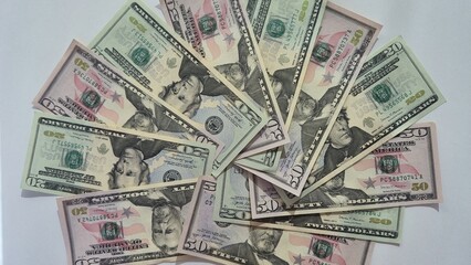 American or US dollars in form of a bunch of fifty and twenty dollar bills - money in the USA