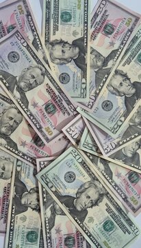 American or US dollars in form of a bunch of fifty and twenty dollar bills - money in the USA