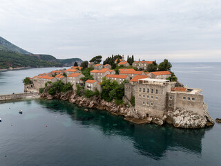 Fototapeta premium Sveti Stefan Island and Beach aerial view in Montenegro