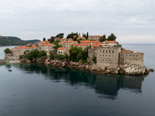 Obraz premium Sveti Stefan Island and Beach aerial view in Montenegro