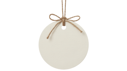 Christmas blank round paper tag with twine bow isolated on transparent background, perfect for adding a personalized message or holiday greeting