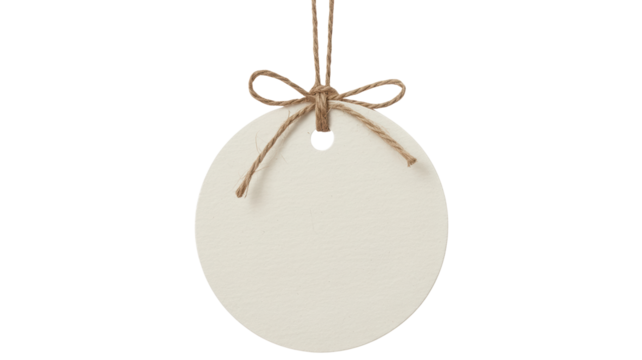 Christmas blank round paper tag with twine bow isolated on transparent background, perfect for adding a personalized message or holiday greeting
