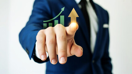Businessman pointing at a glowing upward trending arrow and bar chart representing financial growth