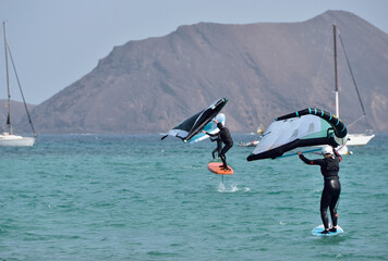 kitesurfer surfing on Atlantic ocean in Corralejo, Fuerteventura, Canary islands, Spain