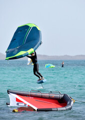 kitesurfer surfing on Atlantic ocean in Corralejo, Fuerteventura, Canary islands, Spain