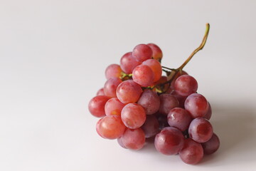 Fresh Red table grapes, likely Red Globe, Crimson Seedless, or Flame Seedless