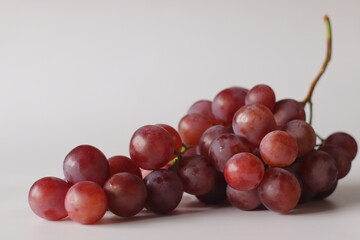 Fresh Red table grapes, likely Red Globe, Crimson Seedless, or Flame Seedless