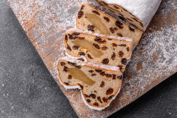 Stollen, a German Christmas pastry for the winter holidays. Stollen as a food background