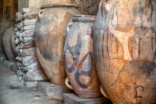 Ancient Minoan clay storage jars in archaeological site of Phaistos, Crete, Greece