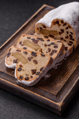 Stollen, a German Christmas pastry for the winter holidays. Stollen as a food background