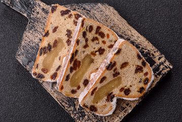 Stollen, a German Christmas pastry for the winter holidays. Stollen as a food background