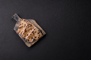 Stollen, a German Christmas pastry for the winter holidays. Stollen as a food background