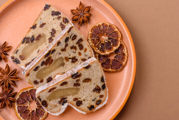 Stollen, a German Christmas pastry for the winter holidays. Stollen as a food background