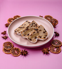 Stollen, a German Christmas pastry for the winter holidays. Stollen as a food background