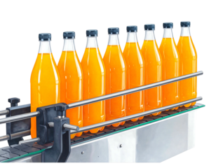 Clear bottles filled with orange liquid travel on a metal conveyor belt against a solid black background