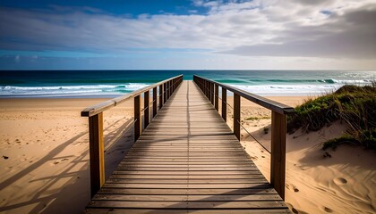 Obraz premium Wooden walkway leading to the ocean
