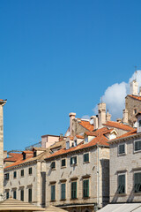 Obraz premium Architectural details of historic buildings in Dubrovnik. Famous tourist destination on the Adriatic coast and a UNESCO heritage site in Croatia.