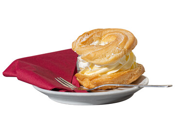 French choux pastry with vanilla filling, custard, and whipped cream. Served in a restaurant at a party. Isolated on white background. V2.