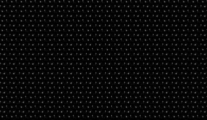 Abstract digital pattern of white dots on black background