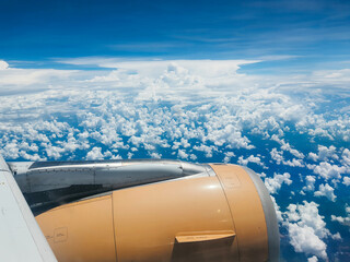 Beautiful blue sky cloud view from airplane window, jet plane window
