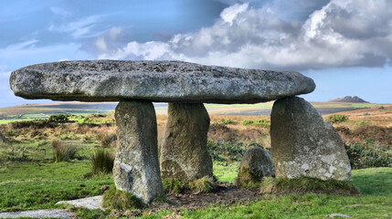 Beautiful and dramatic image of neolithic structure (Lanyon Quoit) in Cornwall with dramatic sky...