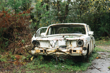 Abandoned Rusty Broken White Passenger Car