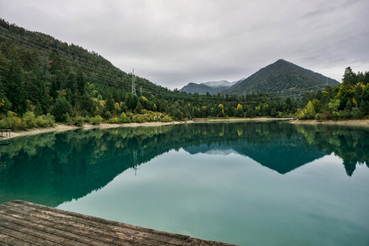 The stunning turquoise waters of Urisee near Reutte, Tyrol.