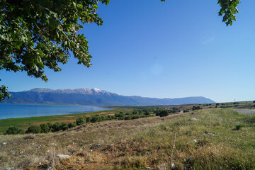 Beautiful seascape with blue sky and white clouds on the beach