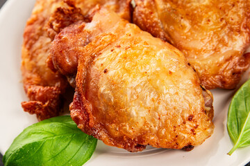 Chicken thighs fried poultry meat dish natural product tasty snack fresh delicious gourmet food background on the table rustic top view copy space