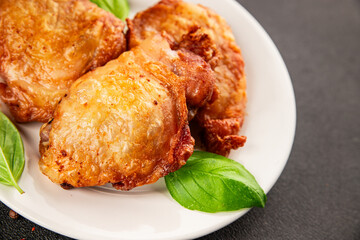 Chicken thighs fried poultry meat dish natural product tasty snack fresh delicious gourmet food background on the table rustic top view copy space
