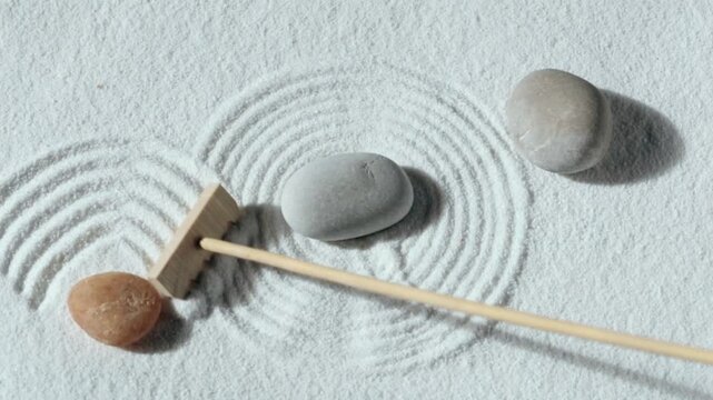 Making zen garden from white sand and stones
