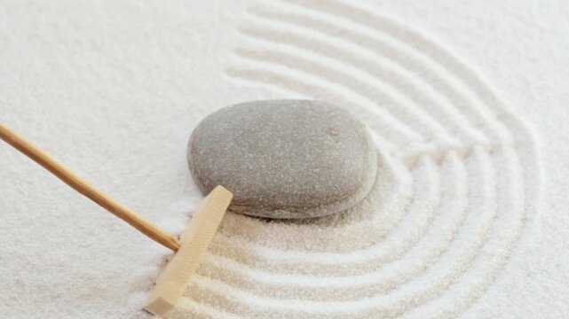 Making zen garden from white sand and stones