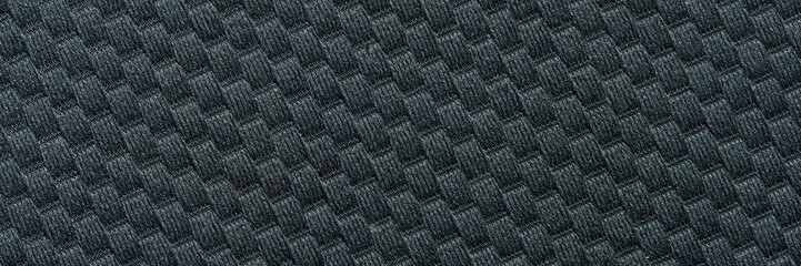 Abstract gray herringbone textile pattern with diagonal striped texture background.