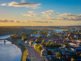 Kaunas old town and modern new city center in autumn, Lithuania. Aerial drone view on golden hour