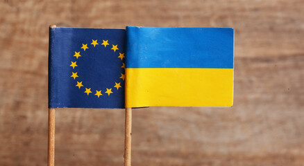 The flags of Ukraine and the EU are small