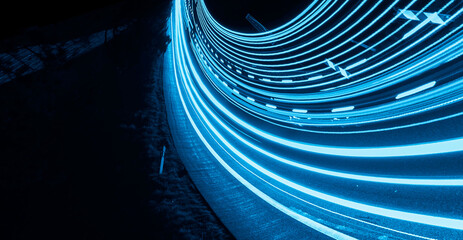 blue car lights at night. long exposure