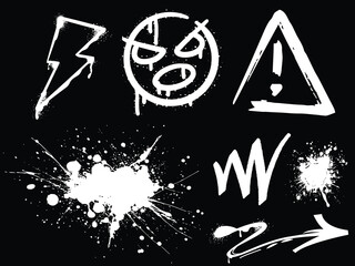 collection of white graffiti elements on a black background including a lightning bolt a smiley and an exclamation mark