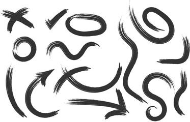 Collection of hand drawn brush stroke symbols and arrows in black on white background