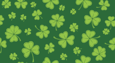 Seamless pattern of green clovers and shamrocks on a dark green background for St. Patrick's Day.