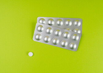 Pill Blister on Color Background, Silver Medicine Capsule Package, Drugs Packaging, Pill Pack