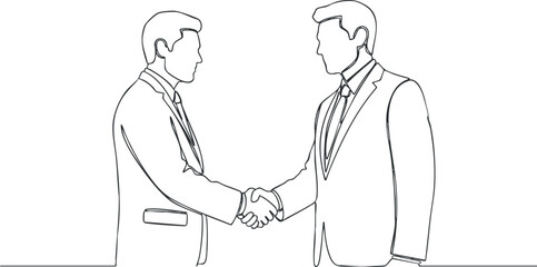 Fototapeta premium Two businessmen shaking hands to signify an agreement or partnership in a professional setting.