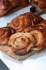 Local cakes and pastries in a central London bakery display